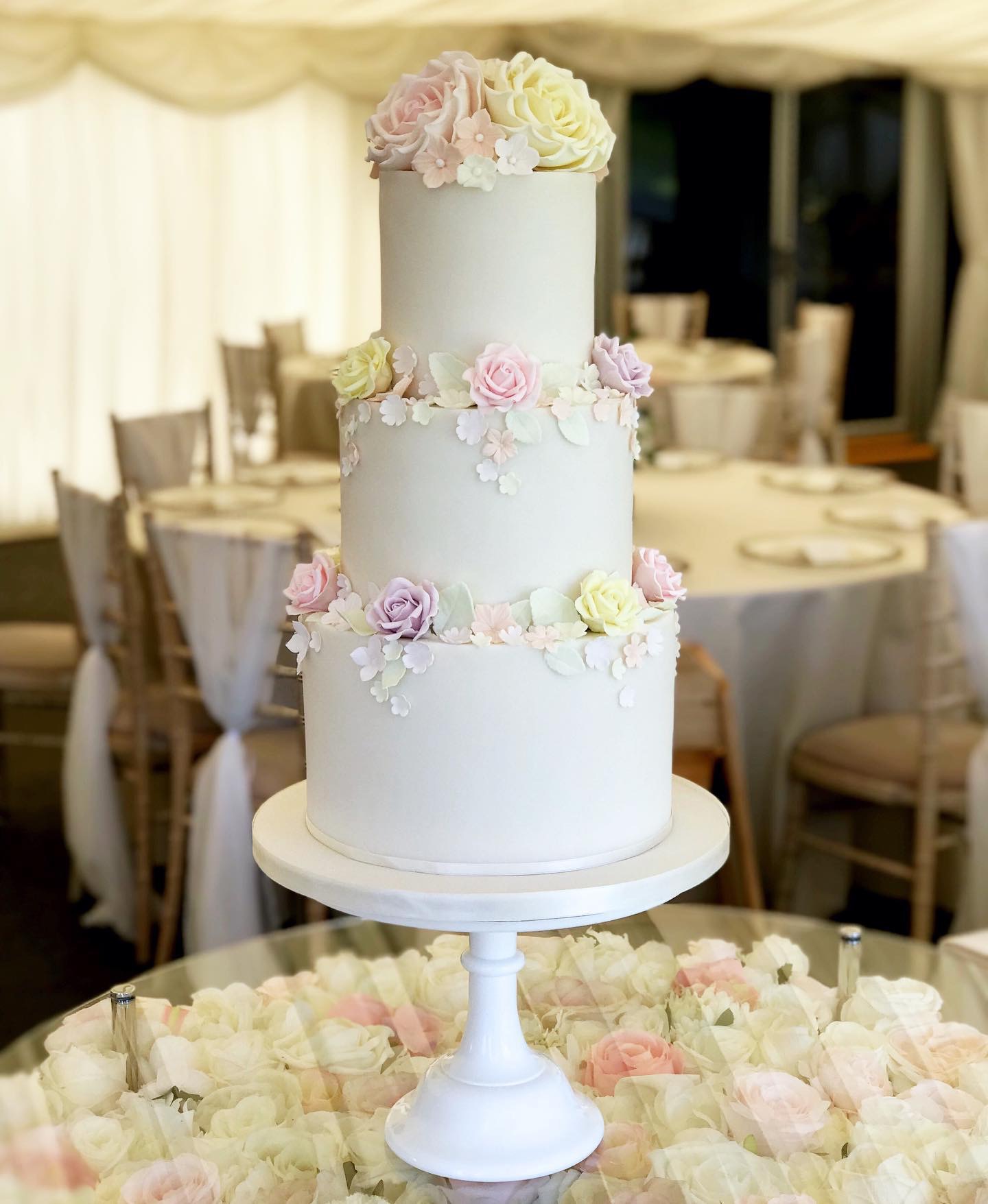 Three tier sugar rose wedding cake at New House Hotel Cardiff
